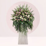 buy funeral flowers on a stand online